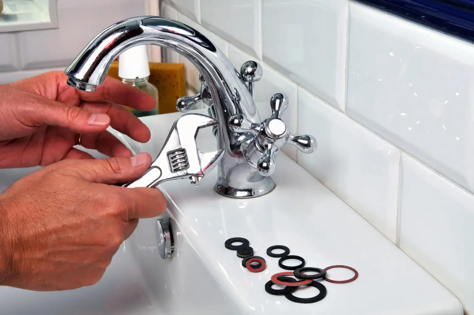 Plumber maintaining a bathroom faucet in Fountain Valley